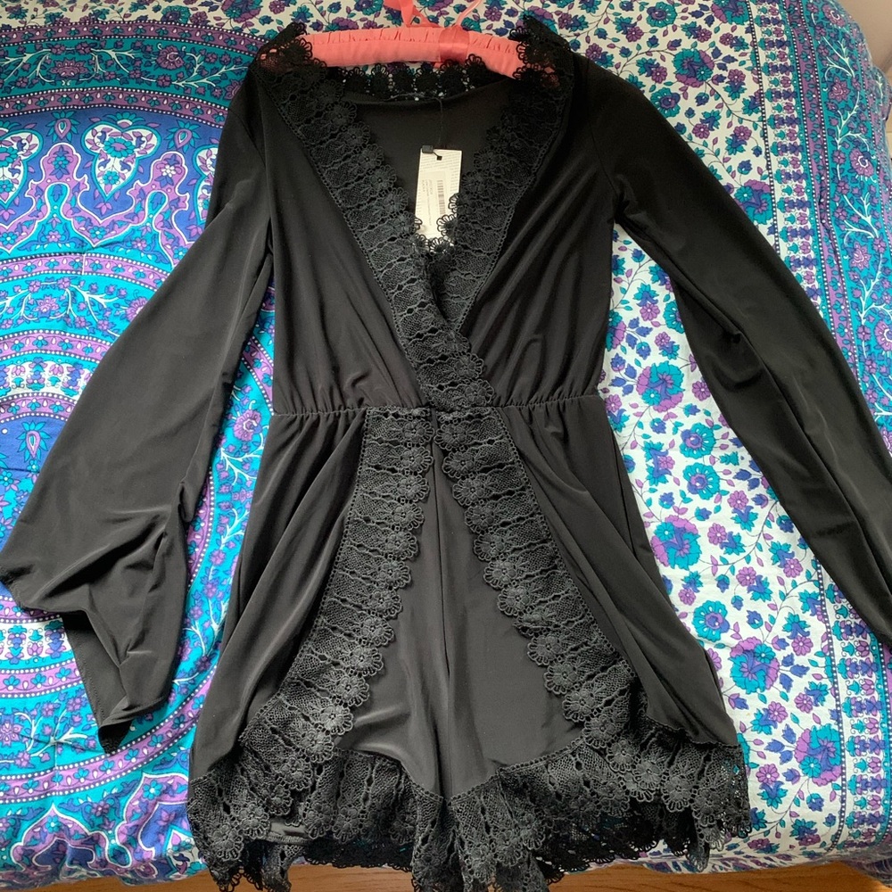 Never been worn, still has a tag on it.